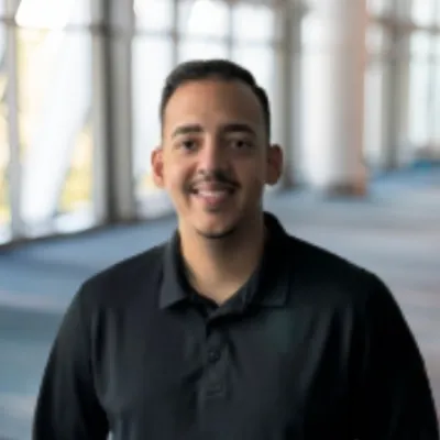 Headshot of Ravel Roman